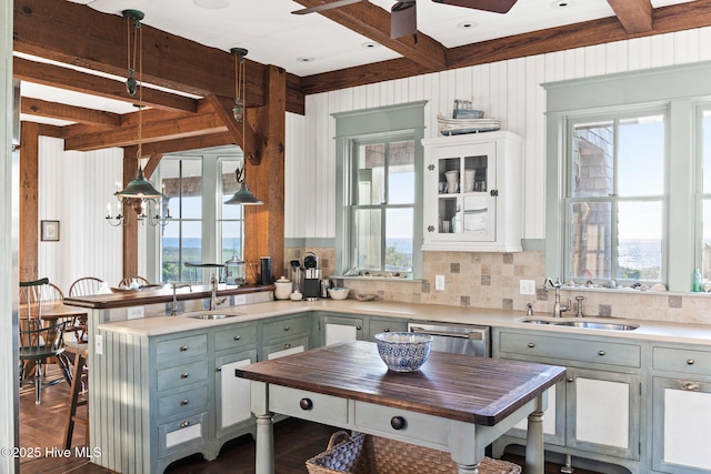 21 Sea Gull Trl, Bald Head Island, NC 28461 - kitchen with a sink, beam ceiling, ceiling fan, decorative backsplash, and butcher block countertops