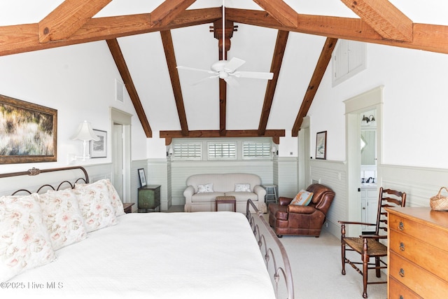 21 Sea Gull Trl, Bald Head Island, NC 28461 - bedroom with beam ceiling, wainscoting, light colored carpet, and high vaulted ceiling