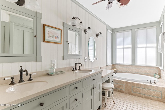 21 Sea Gull Trl, Bald Head Island, NC 28461 - bathroom with a garden tub, a ceiling fan, double vanity, and tile patterned floors