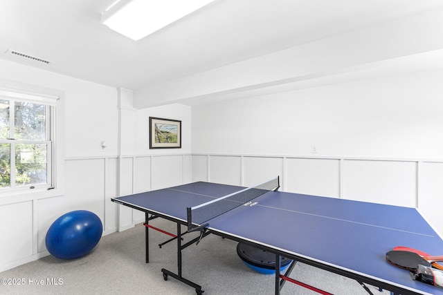 21 Sea Gull Trl, Bald Head Island, NC 28461 - rec room featuring carpet, a wainscoted wall, and a decorative wall