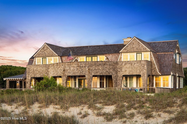 21 Sea Gull Trl, Bald Head Island, NC 28461 - view of front of property with a chimney