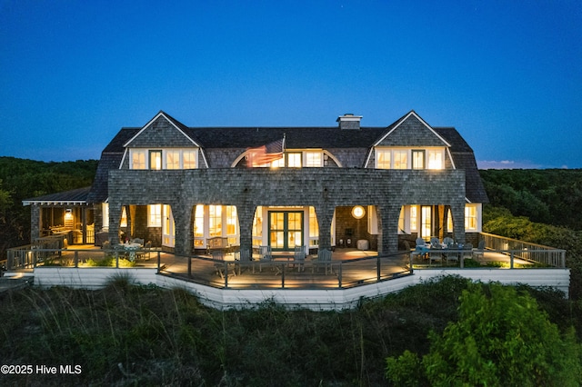 21 Sea Gull Trl, Bald Head Island, NC 28461 - back of house at twilight with a gambrel roof