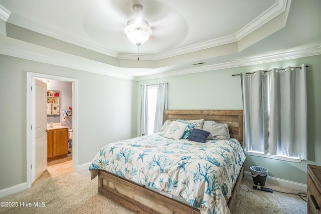 239 Shellbank Dr, Sneads Ferry, NC 28460 - bedroom with ornamental molding, light carpet, baseboards, a raised ceiling, and a ceiling fan
