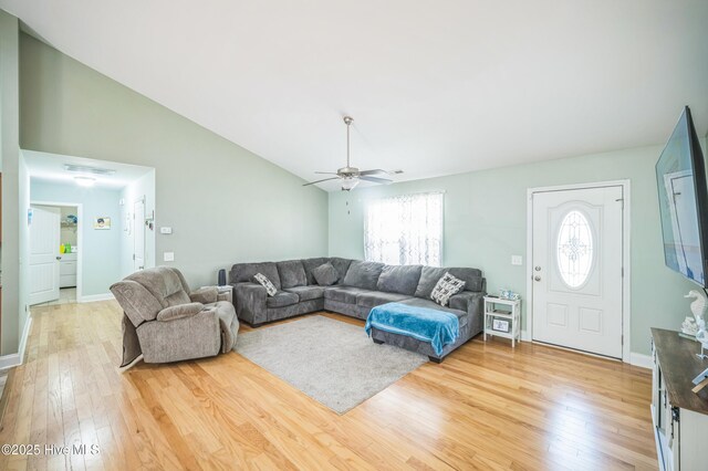 239 Shellbank Dr, Sneads Ferry, NC 28460 - living room with light wood-style flooring, a ceiling fan, lofted ceiling, and baseboards