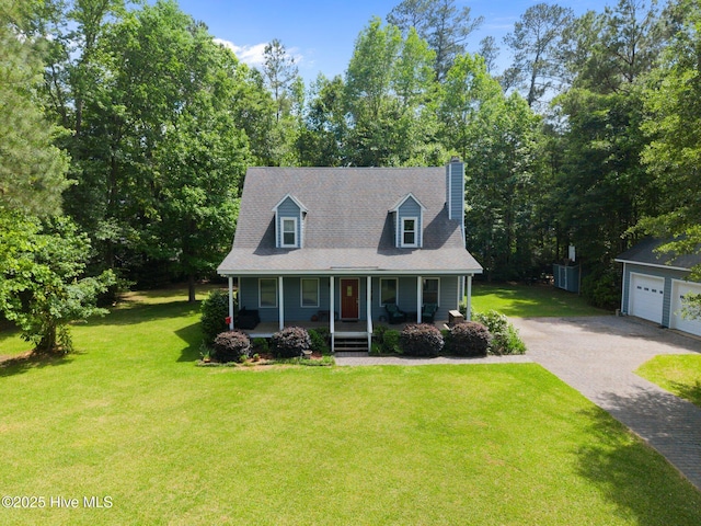 cape cod house with a porch, a chimney, a front lawn, and driveway