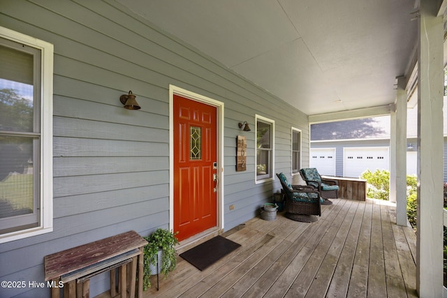 wooden deck featuring covered porch