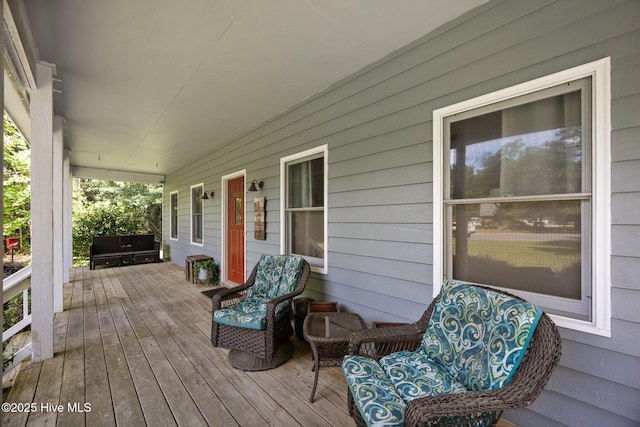 deck featuring a porch