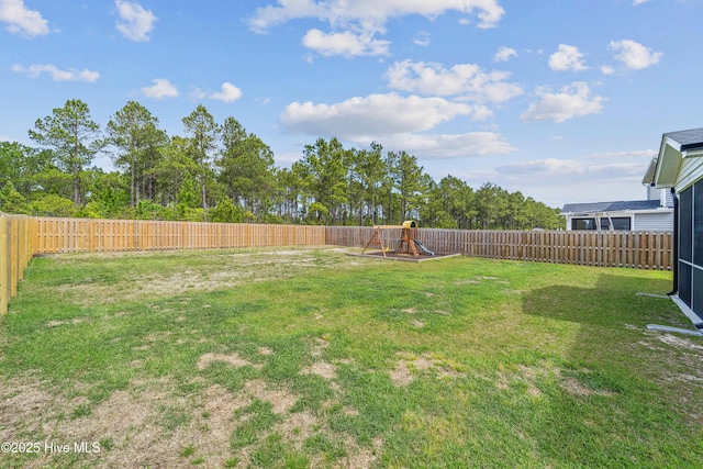 view of yard with a playground