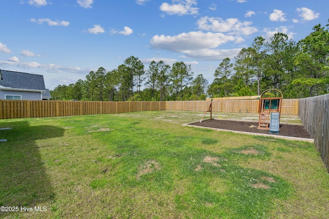 view of yard with a playground