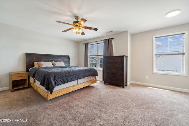 bedroom with baseboards, carpet, and ceiling fan