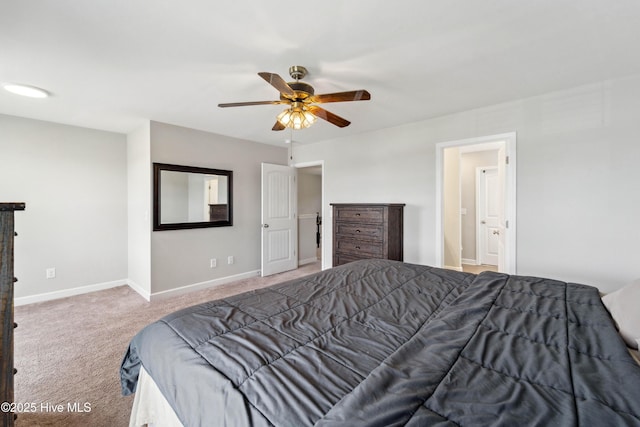 carpeted bedroom with baseboards and ceiling fan