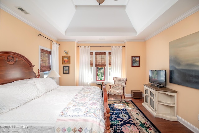 301 Hedrick St, Beaufort, NC 28516 - bedroom with a tray ceiling, wood finished floors, baseboards, and crown molding