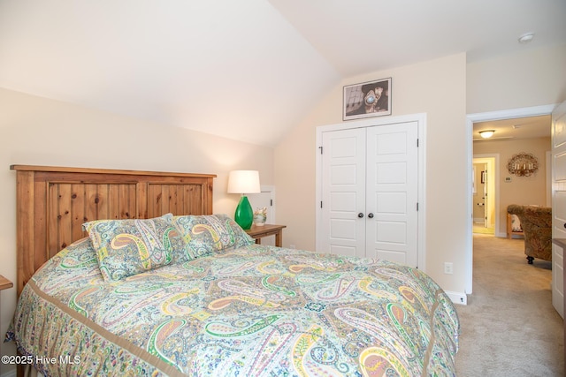 301 Hedrick St, Beaufort, NC 28516 - bedroom with light colored carpet, lofted ceiling, and a closet