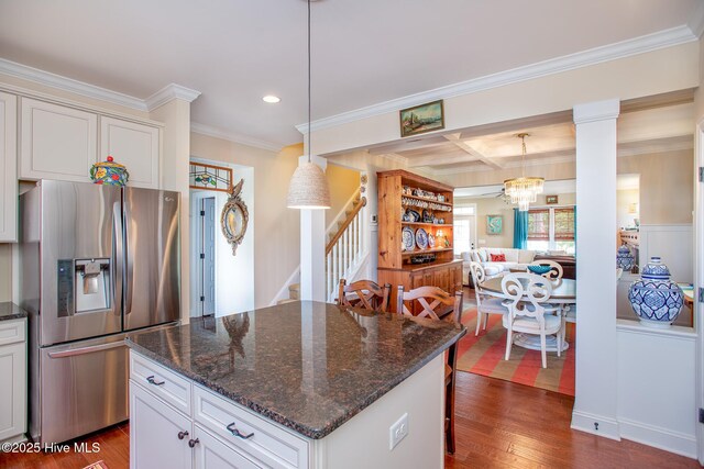 301 Hedrick St, Beaufort, NC 28516 - kitchen featuring stainless steel fridge with ice dispenser, crown molding, dark wood-style floors, a chandelier, and decorative light fixtures
