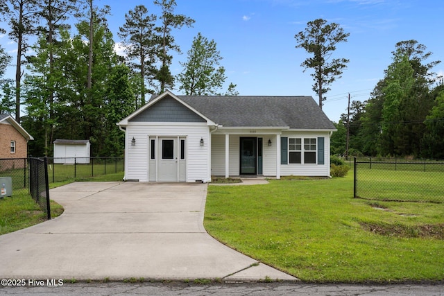view of front of property with concrete driveway and a shingled roof