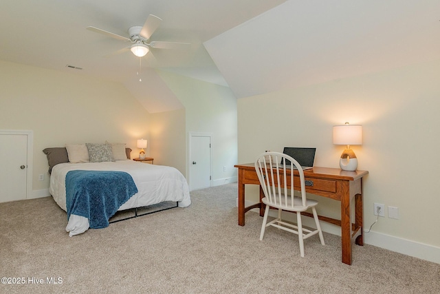 carpeted bedroom with lofted ceiling, an office area, ceiling fan, and baseboards