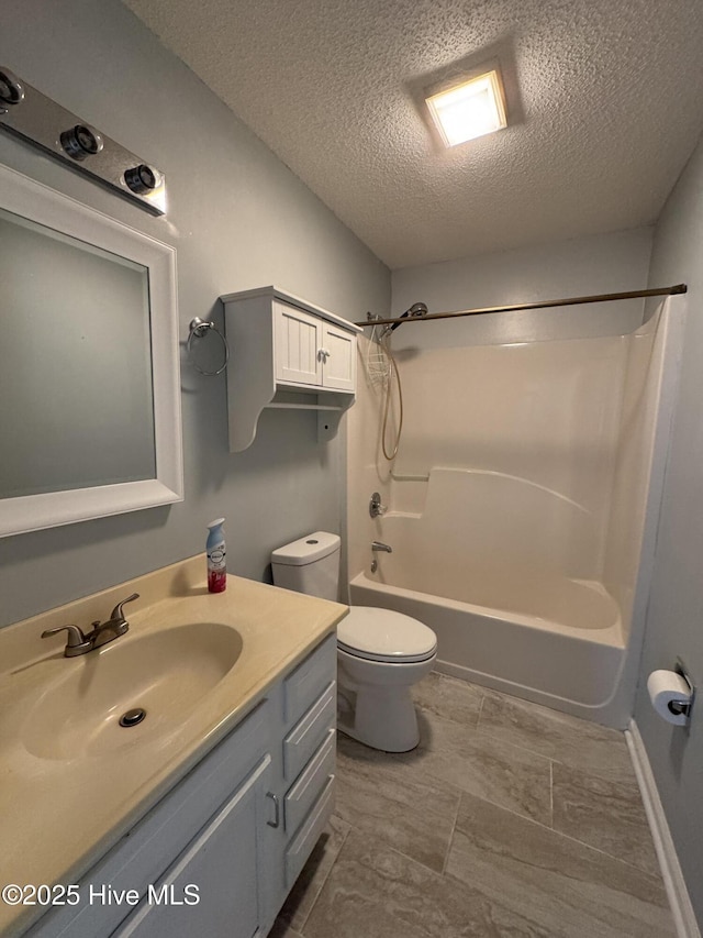 126 W Victoria Ct Unit D, Greenville, NC 27834 - bathroom featuring a textured ceiling, toilet, shower / bath combination, and vanity