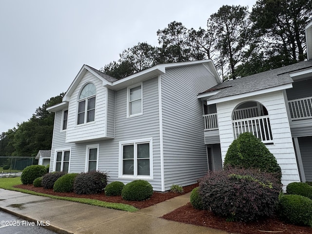 126 W Victoria Ct Unit D, Greenville, NC 27834 - view of side of home with a shingled roof