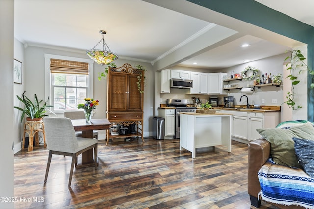 102 E 9th St, Washington, NC 27889 - kitchen with stainless steel appliances, white cabinets, open shelves, a sink, and ornamental molding