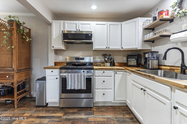 102 E 9th St, Washington, NC 27889 - kitchen with appliances with stainless steel finishes, wooden counters, a sink, open shelves, and recessed lighting