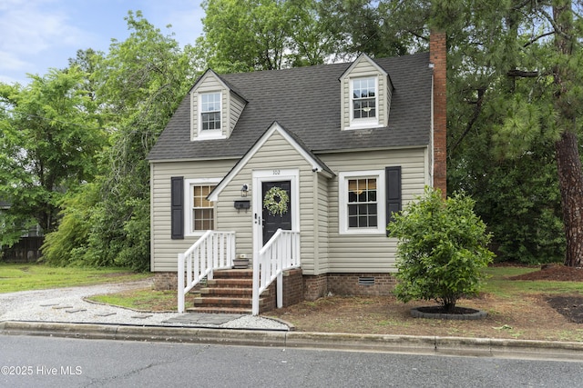 102 E 9th St, Washington, NC 27889 - new england style home featuring roof with shingles and a chimney
