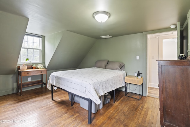 102 E 9th St, Washington, NC 27889 - bedroom featuring wood-type flooring and baseboards