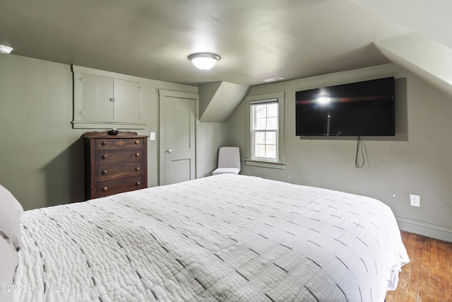 102 E 9th St, Washington, NC 27889 - bedroom featuring wood finished floors and baseboards