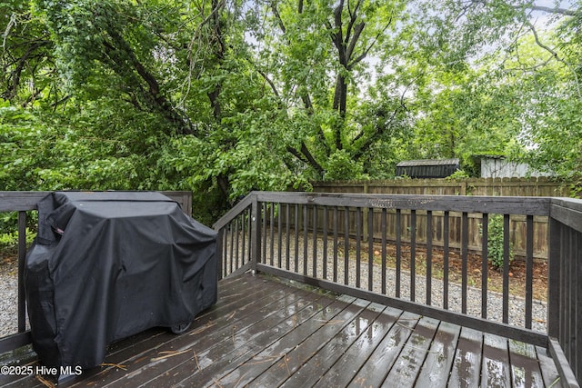 102 E 9th St, Washington, NC 27889 - deck with a fenced backyard and a grill
