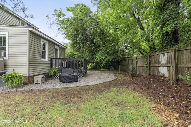 102 E 9th St, Washington, NC 27889 - fenced backyard with a patio and a deck
