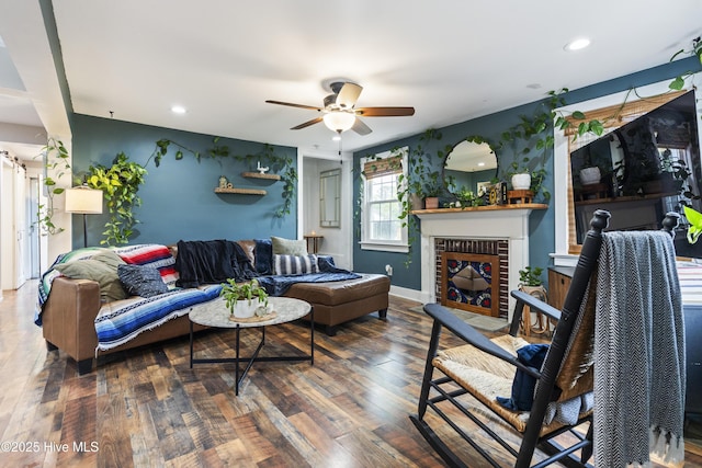 102 E 9th St, Washington, NC 27889 - living room featuring ceiling fan, a brick fireplace, wood finished floors, recessed lighting, and baseboards