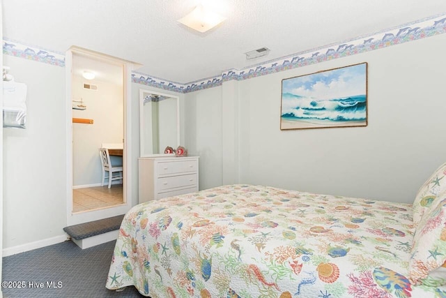 6301 Ocean Dr, Emerald Isle, NC 28594 - bedroom with baseboards and carpet