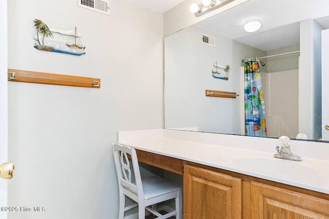 6301 Ocean Dr, Emerald Isle, NC 28594 - full bath with vanity and a shower with shower curtain