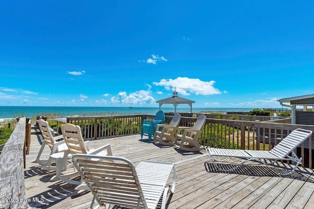 6301 Ocean Dr, Emerald Isle, NC 28594 - wooden deck with view of water and beach