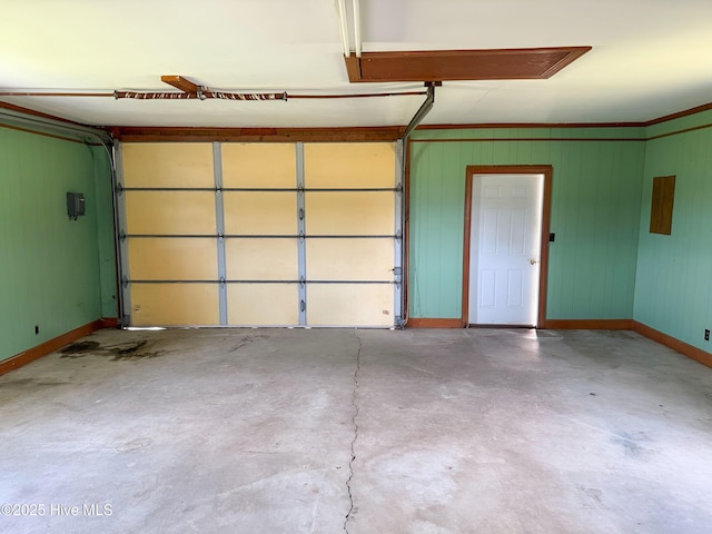garage featuring baseboards