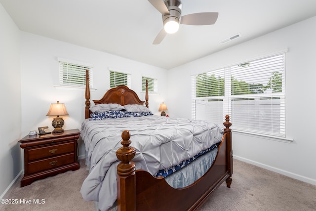 bedroom with carpet, baseboards, and ceiling fan