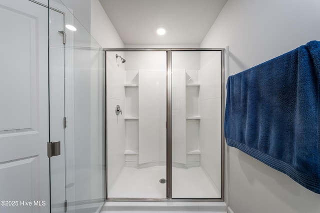 bathroom featuring a stall shower