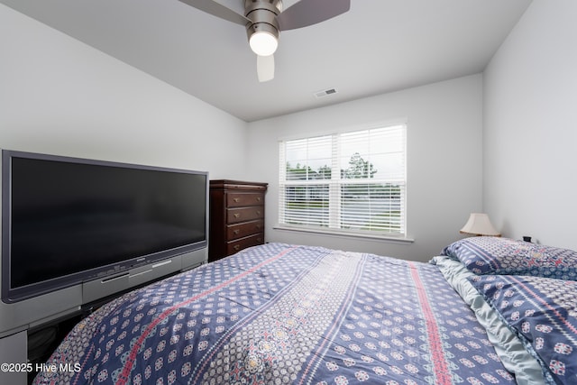 bedroom featuring ceiling fan
