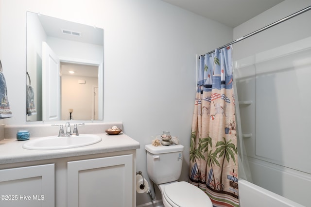bathroom with toilet, vanity, and shower / tub combo with curtain