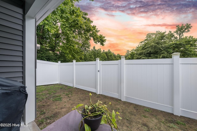 yard at dusk with fence