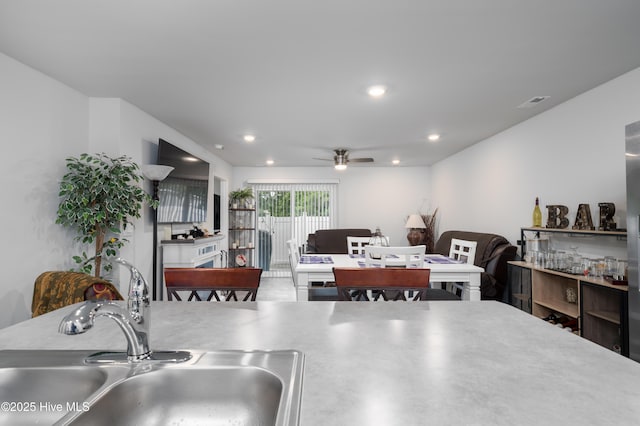 dining space featuring a ceiling fan and recessed lighting