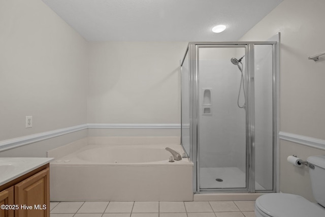 full bathroom with tile patterned flooring, a shower stall, and toilet