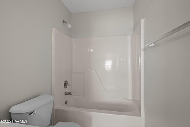 full bathroom with toilet and washtub / shower combination