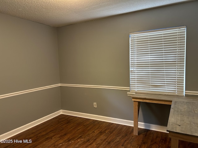 3414 Middle Sound Loop Rd, Wilmington, NC 28411 - spare room with wood finished floors, baseboards, and a textured ceiling