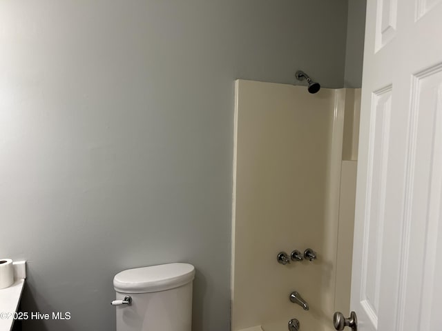3414 Middle Sound Loop Rd, Wilmington, NC 28411 - bathroom featuring toilet and shower / bathtub combination