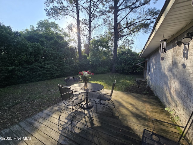 3414 Middle Sound Loop Rd, Wilmington, NC 28411 - wooden terrace featuring outdoor dining area