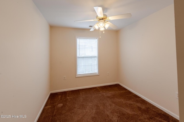 71 Precious Memories Ln, White Lake, NC 28337 - unfurnished room with dark carpet, baseboards, and ceiling fan