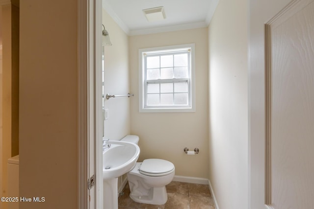 71 Precious Memories Ln, White Lake, NC 28337 - bathroom featuring toilet, crown molding, and baseboards