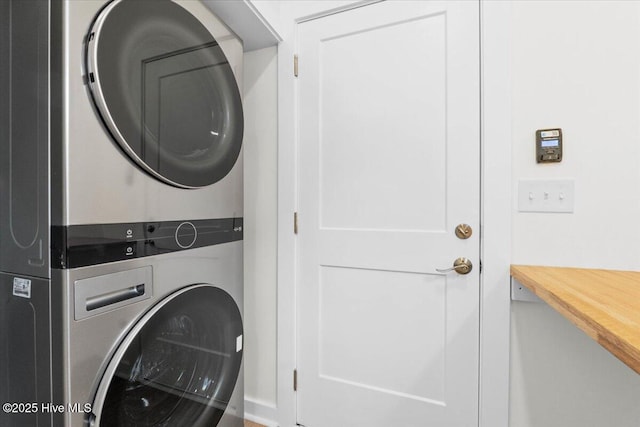 355 S Middleton Dr NW, Calabash, NC 28467 - washroom featuring stacked washer / drying machine and baseboards
