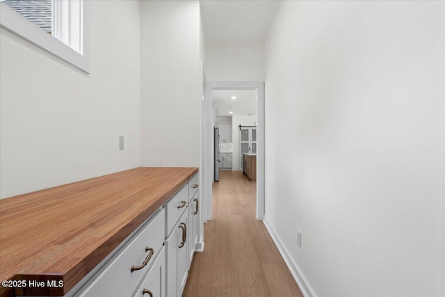 355 S Middleton Dr NW, Calabash, NC 28467 - hallway with light wood-type flooring, recessed lighting, and baseboards