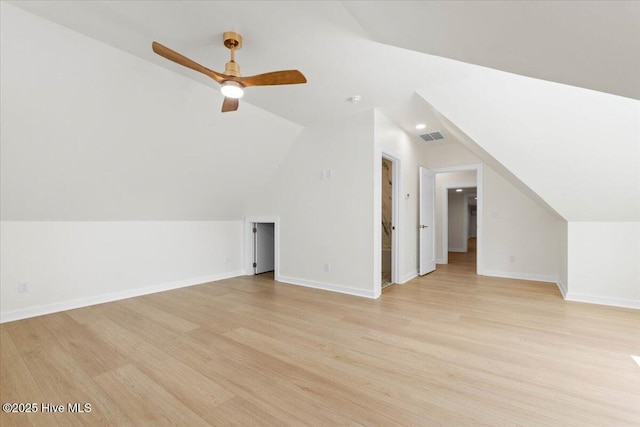 355 S Middleton Dr NW, Calabash, NC 28467 - bonus room with light wood-style floors, vaulted ceiling, ceiling fan, and baseboards